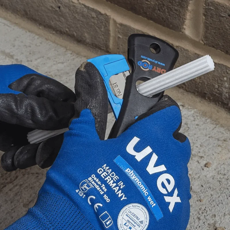 Dryrod System Rod Cutting Tool being Cut On Site - Toner Dampproofing Supplies Ltd